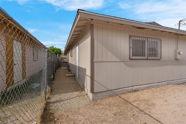 View of home's exterior featuring a fenced backyard | Image 34