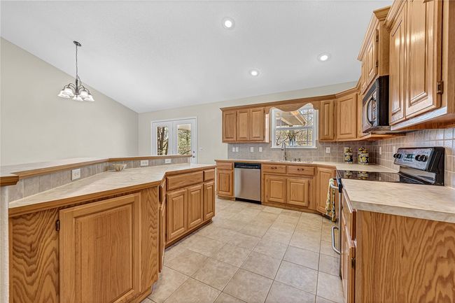 Nice cabinets with pull out drawers. | Image 8