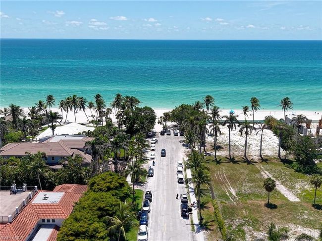 Aerial view of waterfront with a beach | Image 7