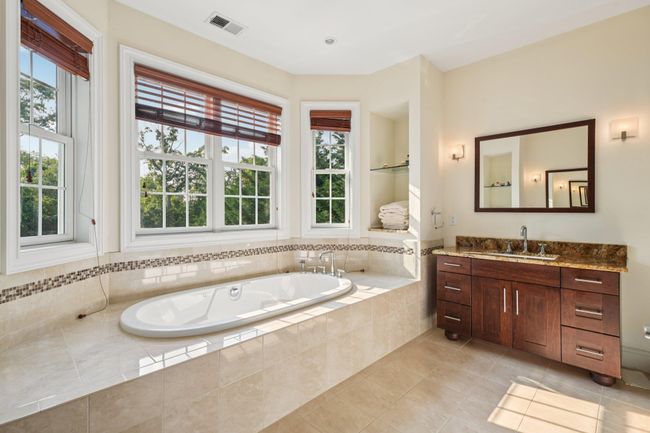 Primary Custom Bath with Whirlpool Tub and Custom Flooring, and Large Shower | Image 23