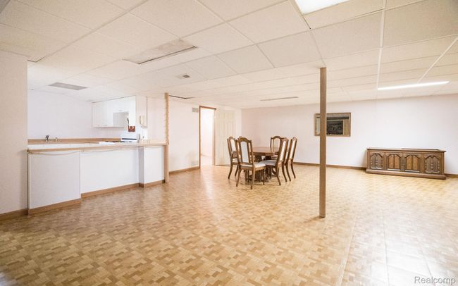 Finished basement with rec room space & kitchen | Image 22