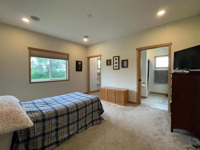 Primary Bedroom with private bath and walk-in closet. | Image 14