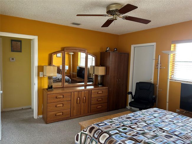 BEDROOM;DOOR TO BACK ALLEY | Image 17