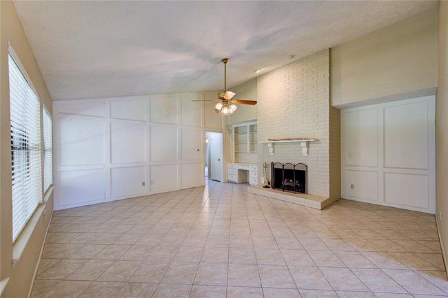 Another view of the family room - looking towards the bedrooms. | Image 7