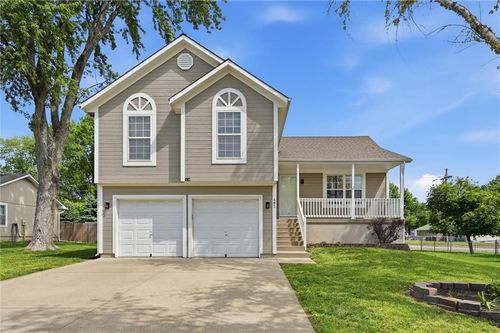 402 Belmont Dr, Raymore, MO, 64083-8458 | Card Image