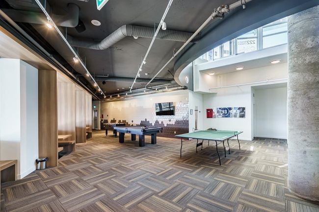 Game room with carpet, billiards table, a towering ceiling, and baseboards | Image 37