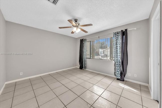 0 - 9780 W Daffodil Ln, Home with 3 bedrooms, 2 bathrooms and null parking in Miramar FL | Image 31