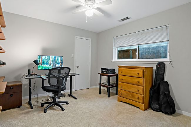 Carpeted bedroom featuring baseboards, and a ceiling fan | Image 22