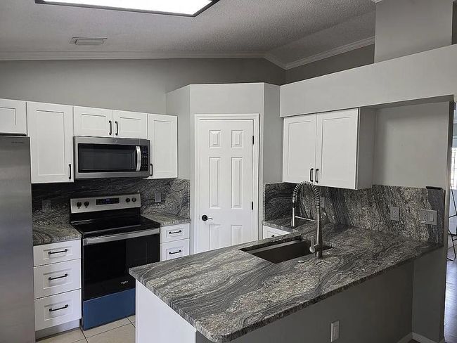 1817 Sw Leafy Rd, House other with 3 bedrooms, 2 bathrooms and null parking in Port St. Lucie FL | Image 9