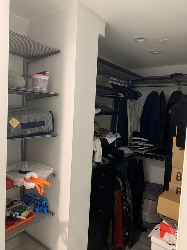 View of spacious closet | Image 6