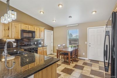 Main home kitchen eating area | Image 2