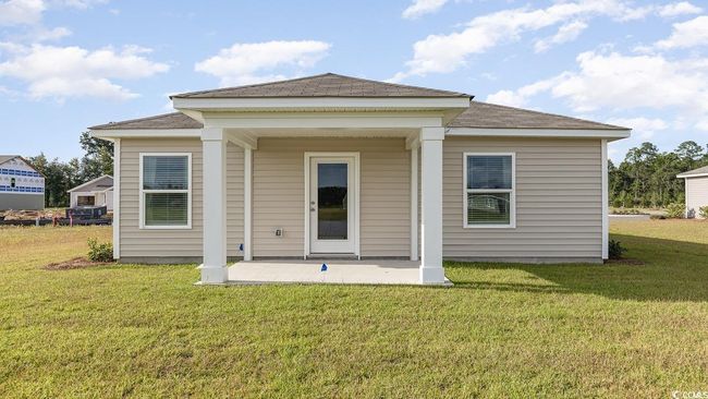 Back of property featuring a patio area and a lawn | Image 23