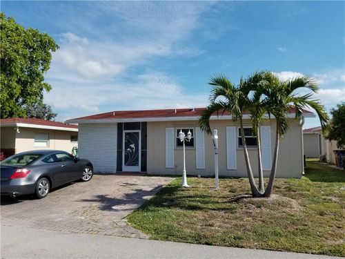 1751 Nw 48th Pl, Deerfield Beach, FL, 33064-1026 | Card Image