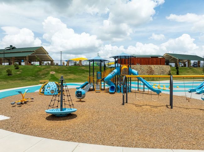 Kids will love the multiple playgrounds scattered throughout Sunfield, designed for year-round fun. | Image 29