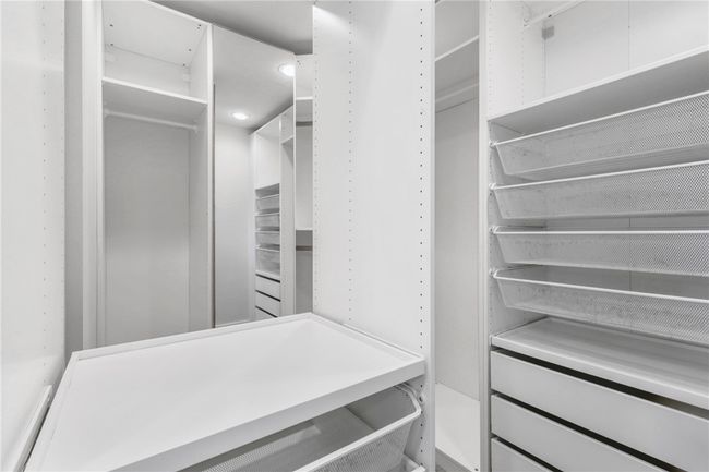 View of spacious closet | Image 19