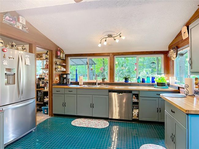 Kitchen is light and bright, and has been completely remodeled over the past few years. | Image 14