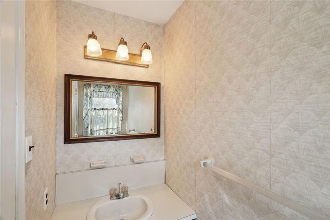 Bathroom with a sink | Image 29