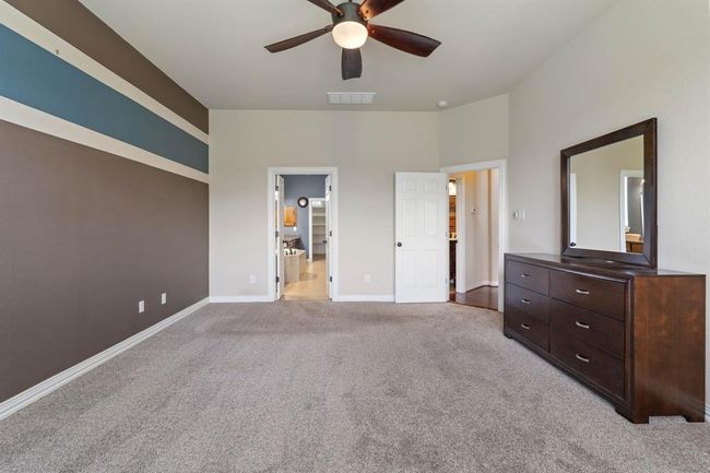 There is ample room for a king-sized bed and sitting chairs by the window. | Image 20