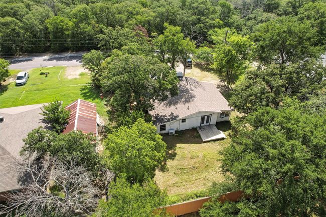 View from above of property with a forest | Image 19