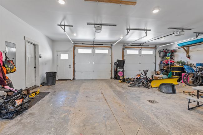 Garage featuring a garage door opener | Image 50