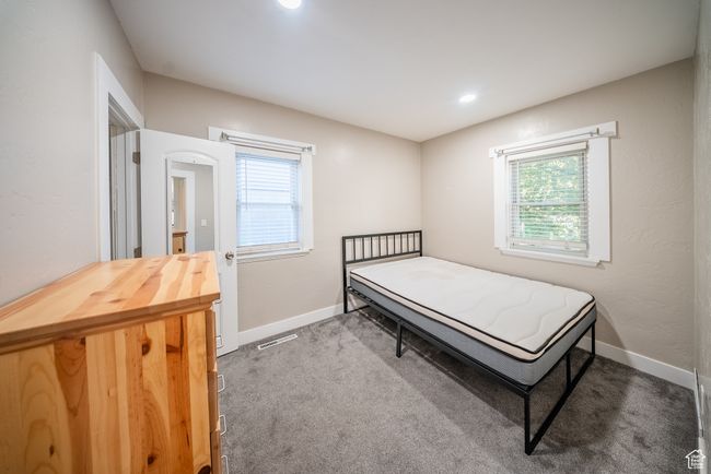 Bedroom with carpet | Image 15