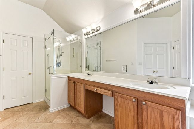 Double vanity with glass shower and soaker jetted tub | Image 29