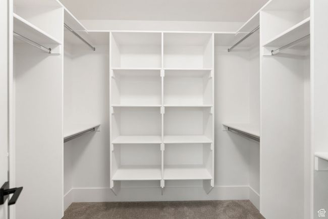 Spacious closet with carpet | Image 11