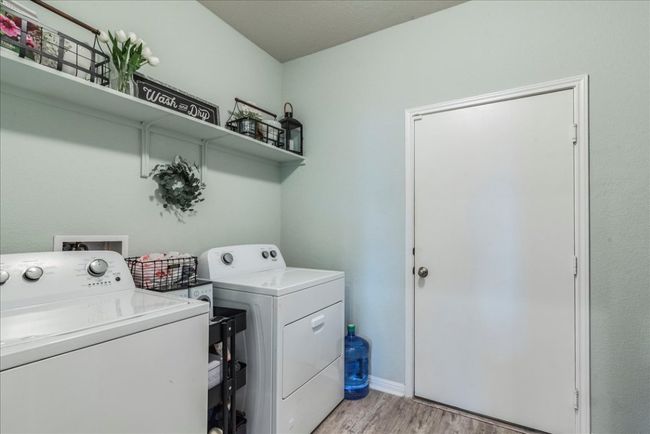 Laundry room with built-in shelving | Image 31