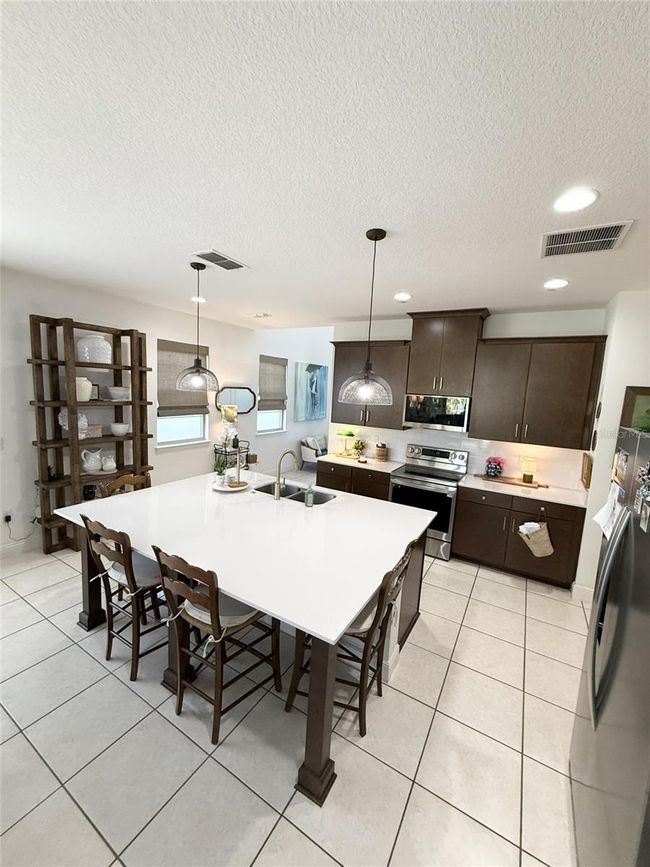 6608 Harper Way, House other with 4 bedrooms, 4 bathrooms and null parking in HARMONY FL | Image 7
