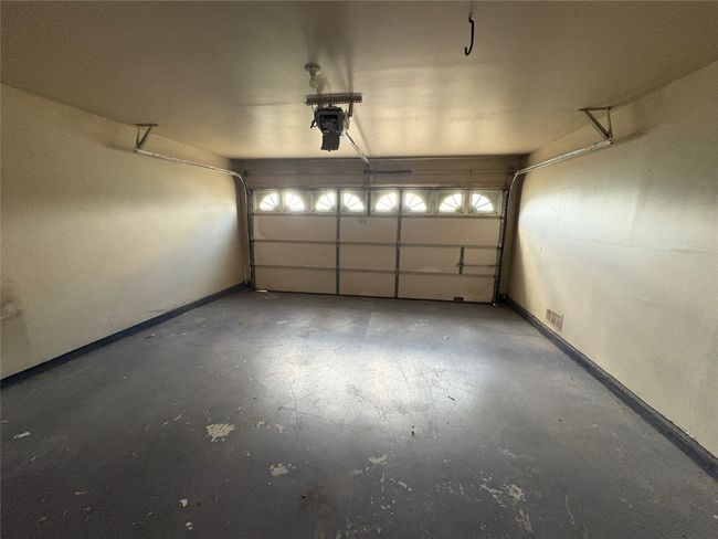Garage featuring baseboards | Image 20