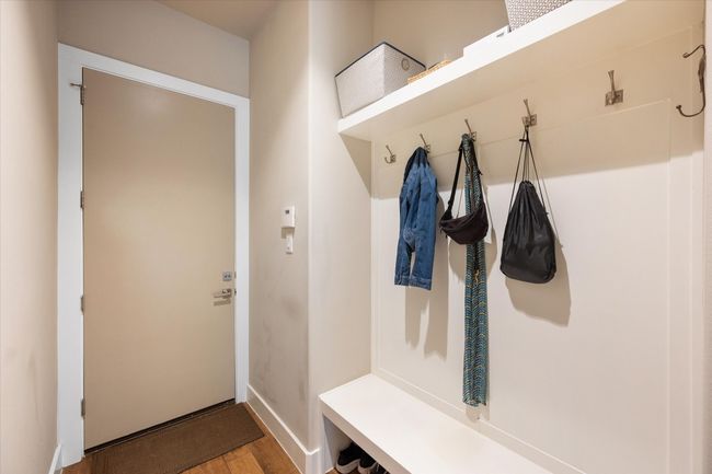 Mudroom area with hooks, shelving and bench | Image 23