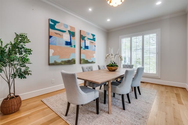 Dining room featuring baseboards, ornamental molding, light wood-style flooring, and recessed lighting | Image 7