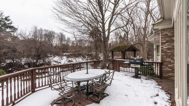 Beautiful views of treed rear yard. | Image 16