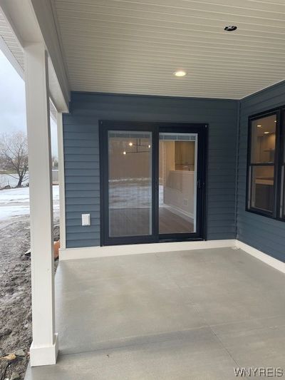 Covered patio off the sunroom | Image 2