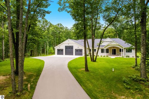 687 Starflower Ln, Traverse City, MI, 49696-8542 | Card Image
