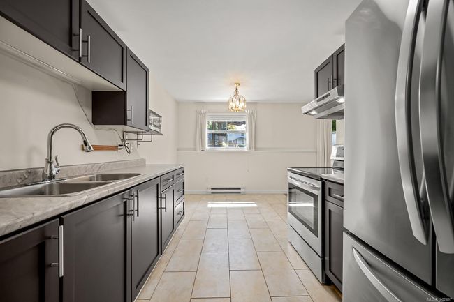 DINING ROOM OFF THE KITCHEN | Image 12