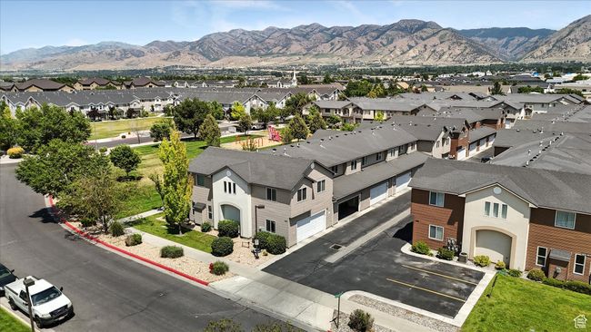 Aerial view of residential area featuring a mountain backdrop | Image 35