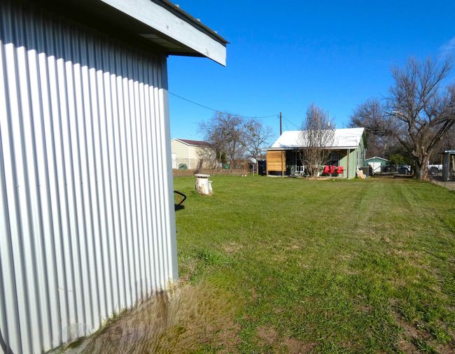 1005 Elm St, House other with 3 bedrooms, 2 bathrooms and null parking in Llano TX | Image 17