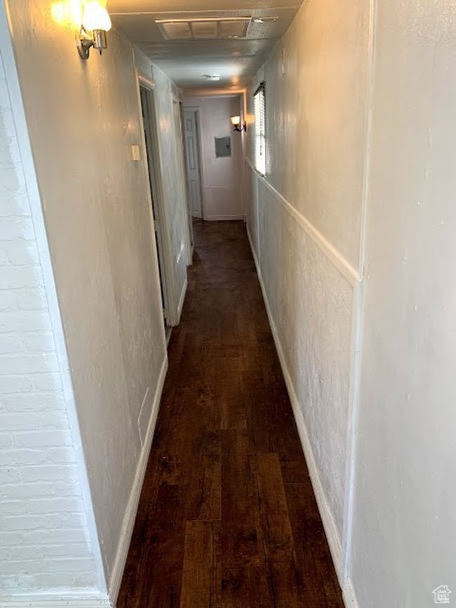 Hall featuring dark hardwood / wood-style floors | Image 7