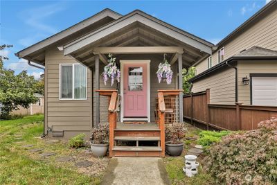 Front entry to covered porch - Charm Galore! | Image 1