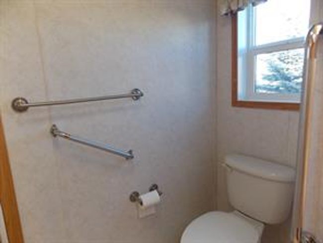 77 - 5210 65 Ave, Home with 3 bedrooms, 2 bathrooms and 3 parking in Olds AB | Image 26