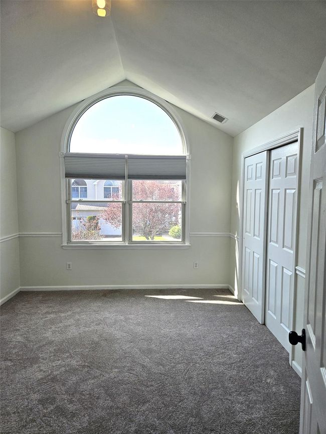 The Second Bedroom Offers Cathedral Ceilings, A Stunning Circle Topped Double Window, New Carpeting & A Double Sized Closet. It Could Also Be A Wonderful Den Or Home Office. | Image 12