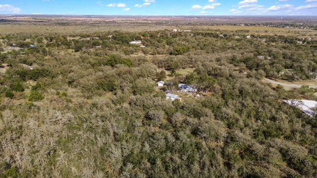 Aerial overview of property's location with a forest | Image 32