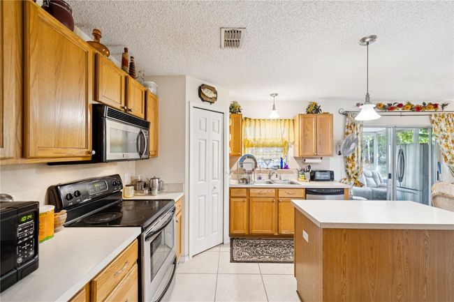 3411 Landover Blvd, House other with 5 bedrooms, 3 bathrooms and null parking in Spring Hill FL | Image 9
