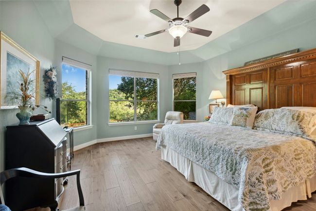 Owner's Suite with Bay Window Hill Country views. | Image 15