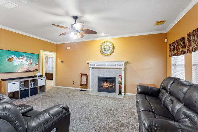 Living Room- view to Primary Suite entrance | Image 8