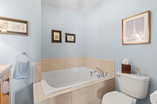 This tub is a great place to unwind at the end of a busy day. Plumbing directly behind this wall makes it easy to add a shower too! | Image 48