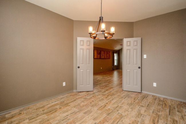 Double doors ensure privacy in the study. | Image 8