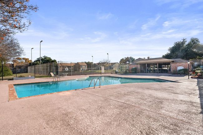 View of community pool and pool house | Image 35