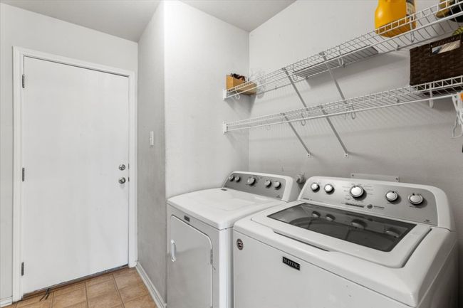 Laundry room with pantry shelving | Image 24
